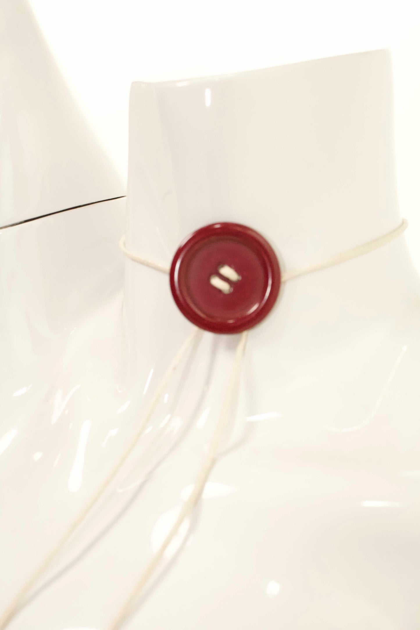 Runaway Muse Button Tie
