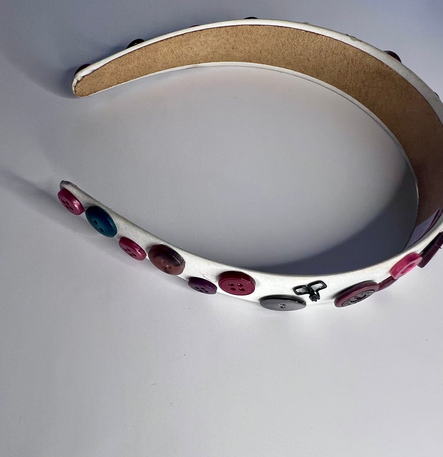 Hooked button headband