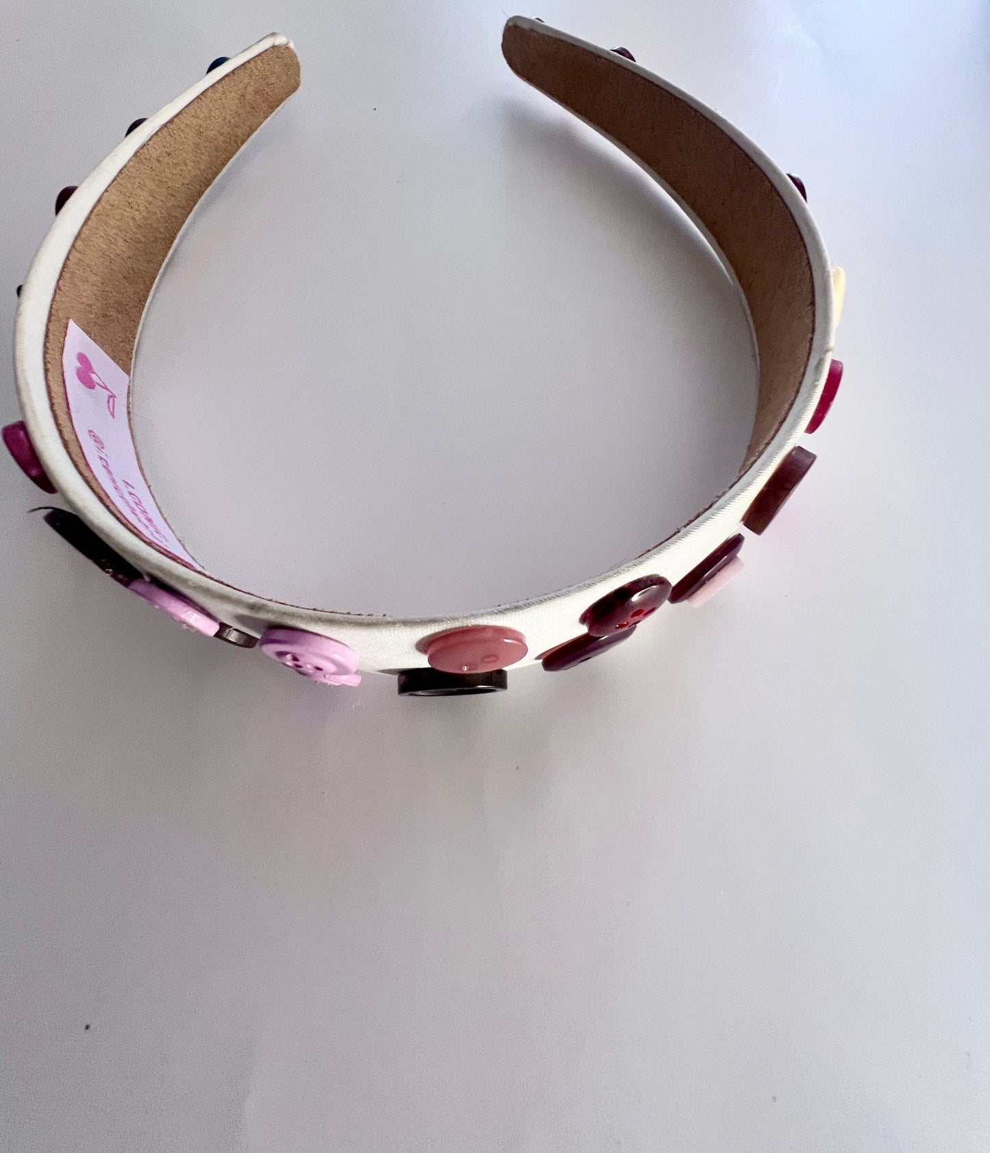 Hooked button headband