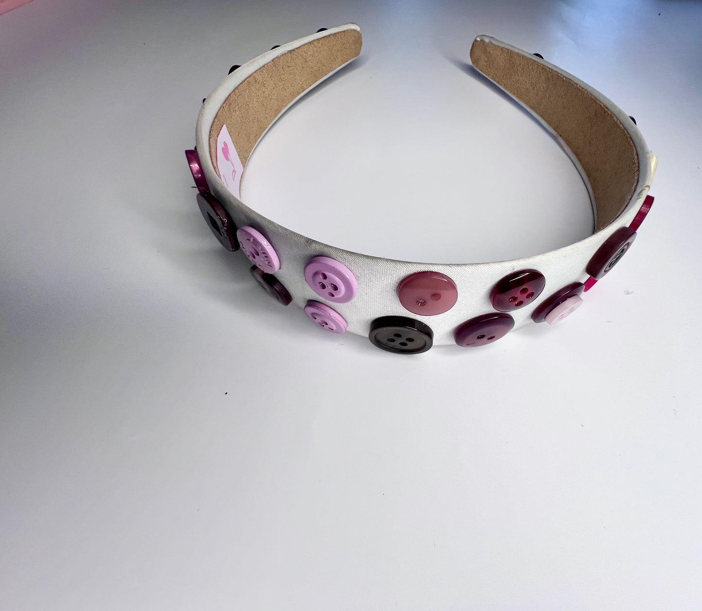 Hooked button headband