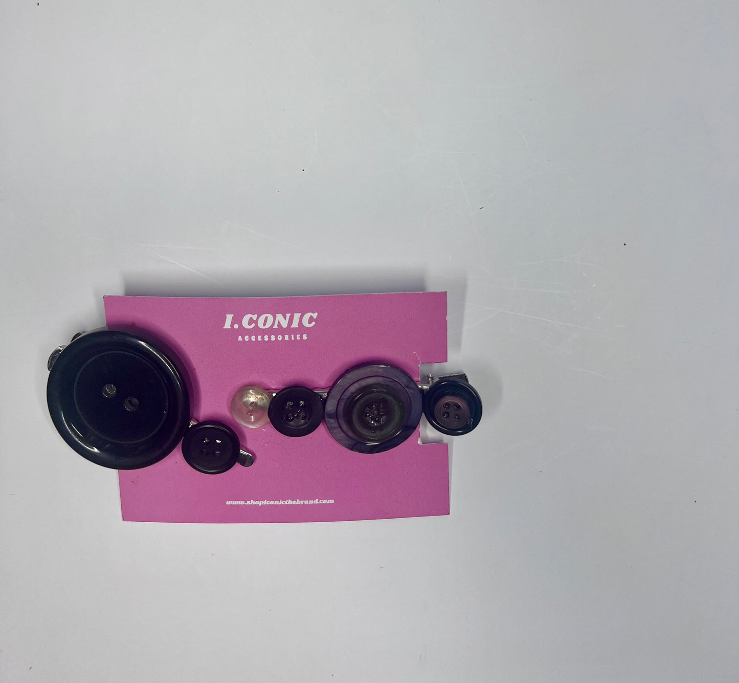 Mutable signs button clips